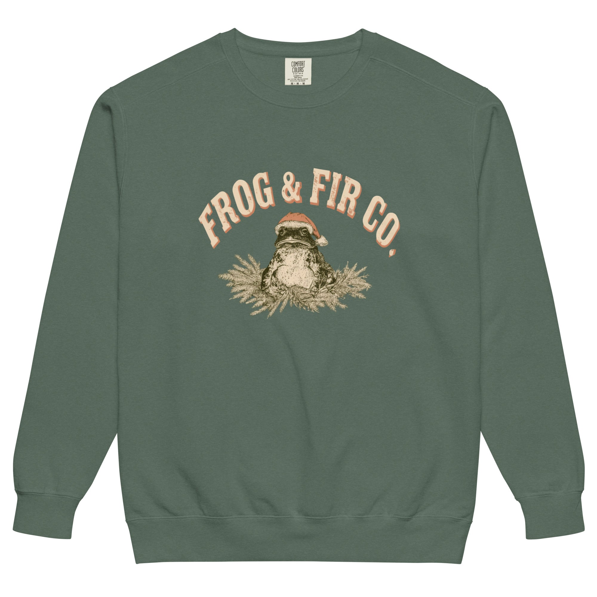 Toad and ferns badge design on a Blue Spruce garment-dyed sweatshirt