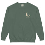 Sleepy fox in a crescent moon design on a Blue Spruce garment-dyed sweatshirt