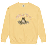 Toad and ferns badge design on a Butter garment-dyed sweatshirt