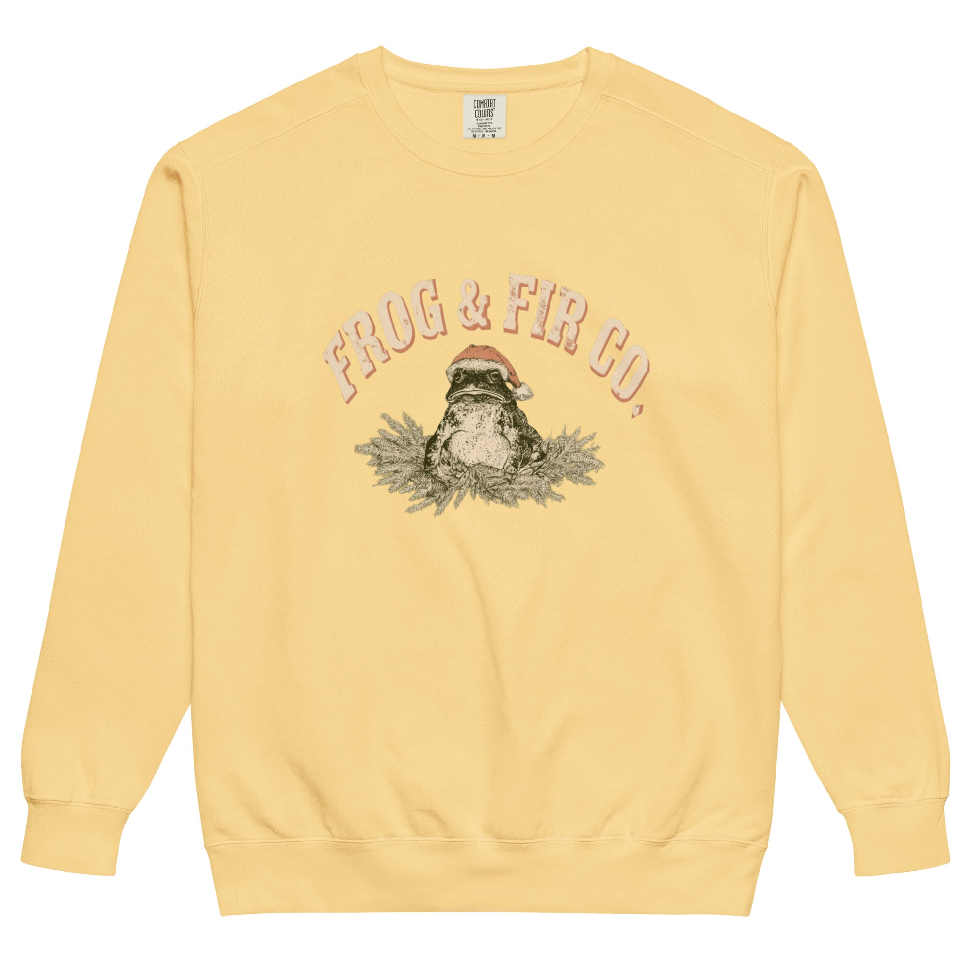 Toad and ferns badge design on a Butter garment-dyed sweatshirt