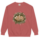 Fox asleep in a Christmas wreath design on a Crimson garment-dyed sweatshirt