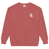 Snowman and Christmas tree design on a Crimson garment-dyed sweatshirt