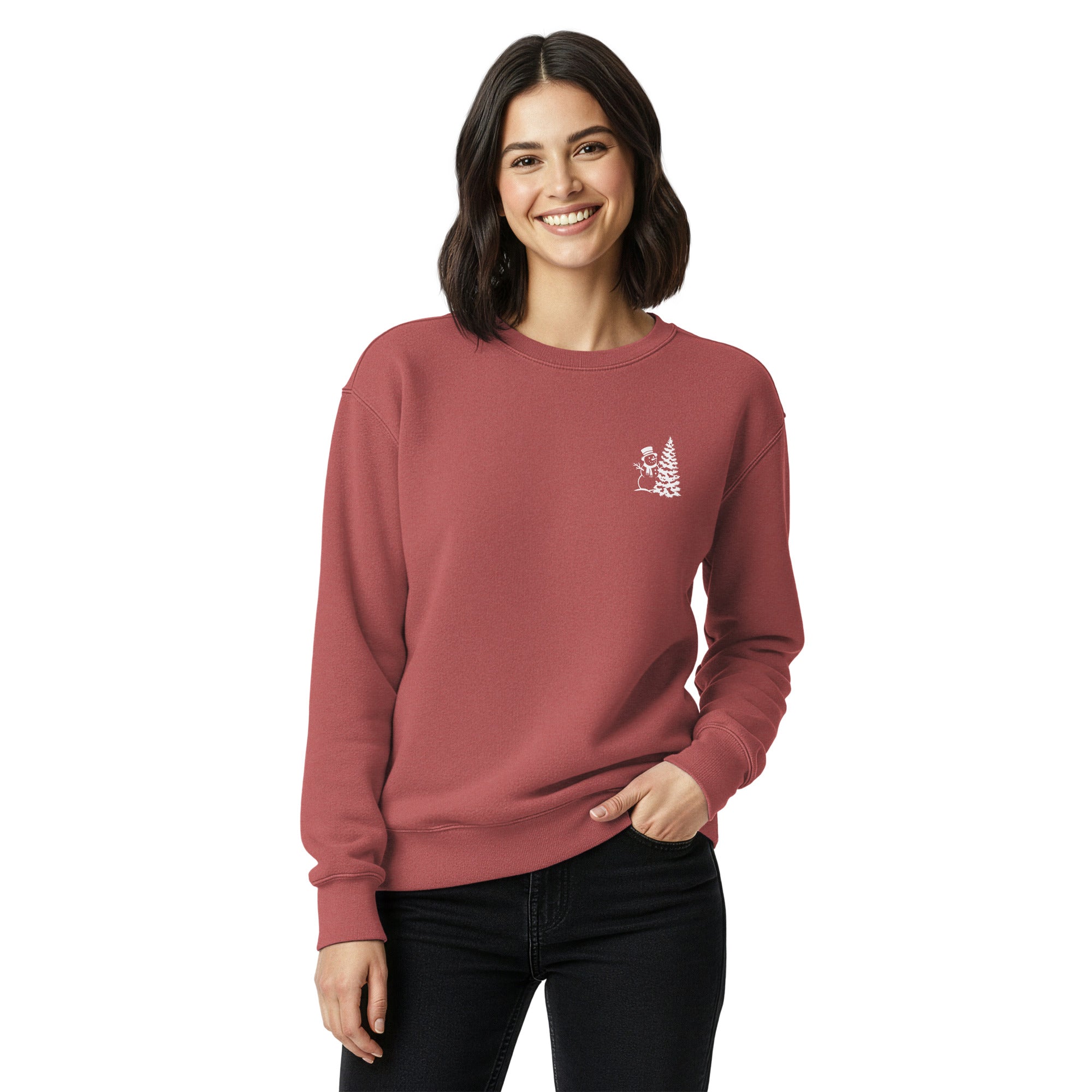 Snowman and Christmas tree design on a Crimson garment-dyed sweatshirt