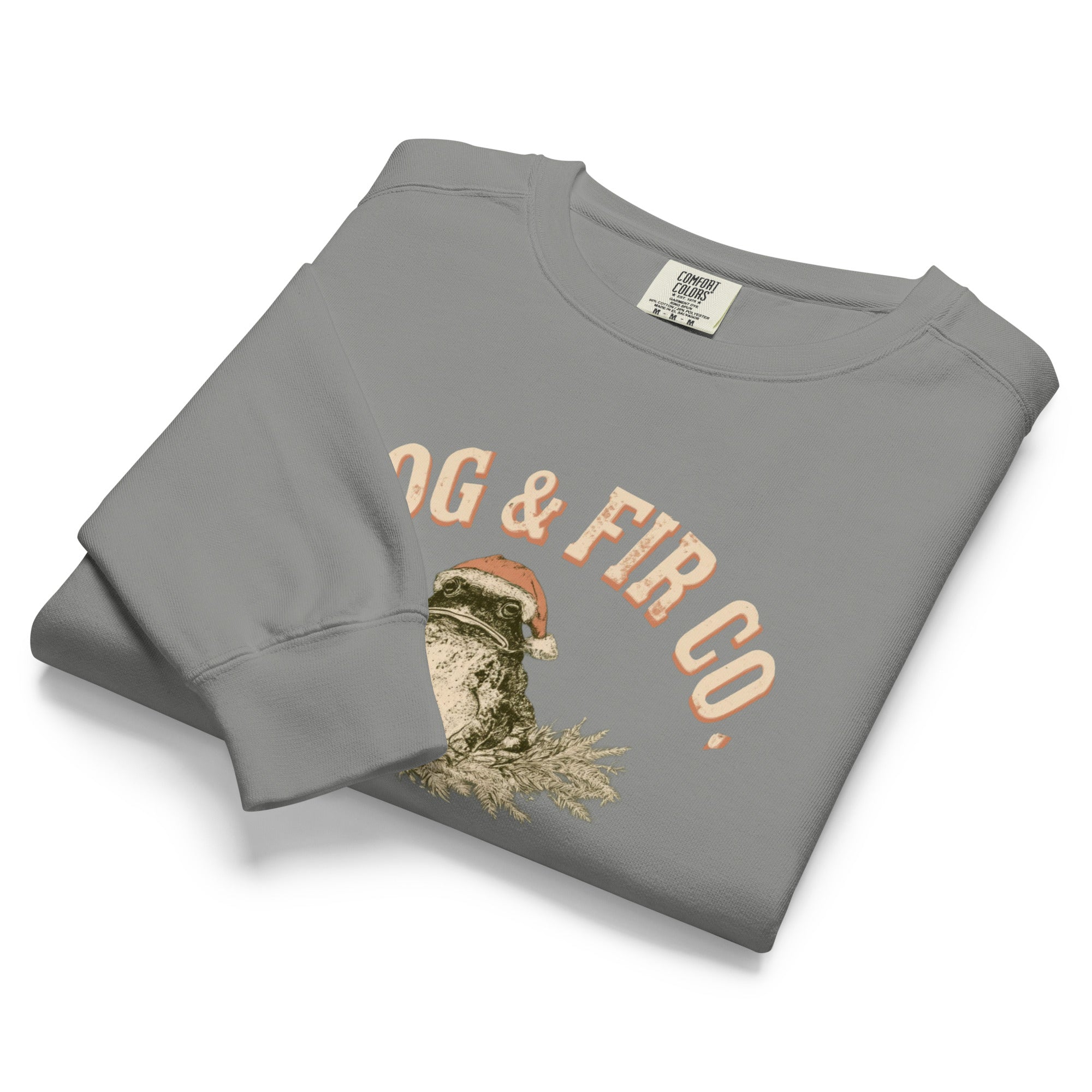 Toad and ferns badge design on a Grey garment-dyed sweatshirt