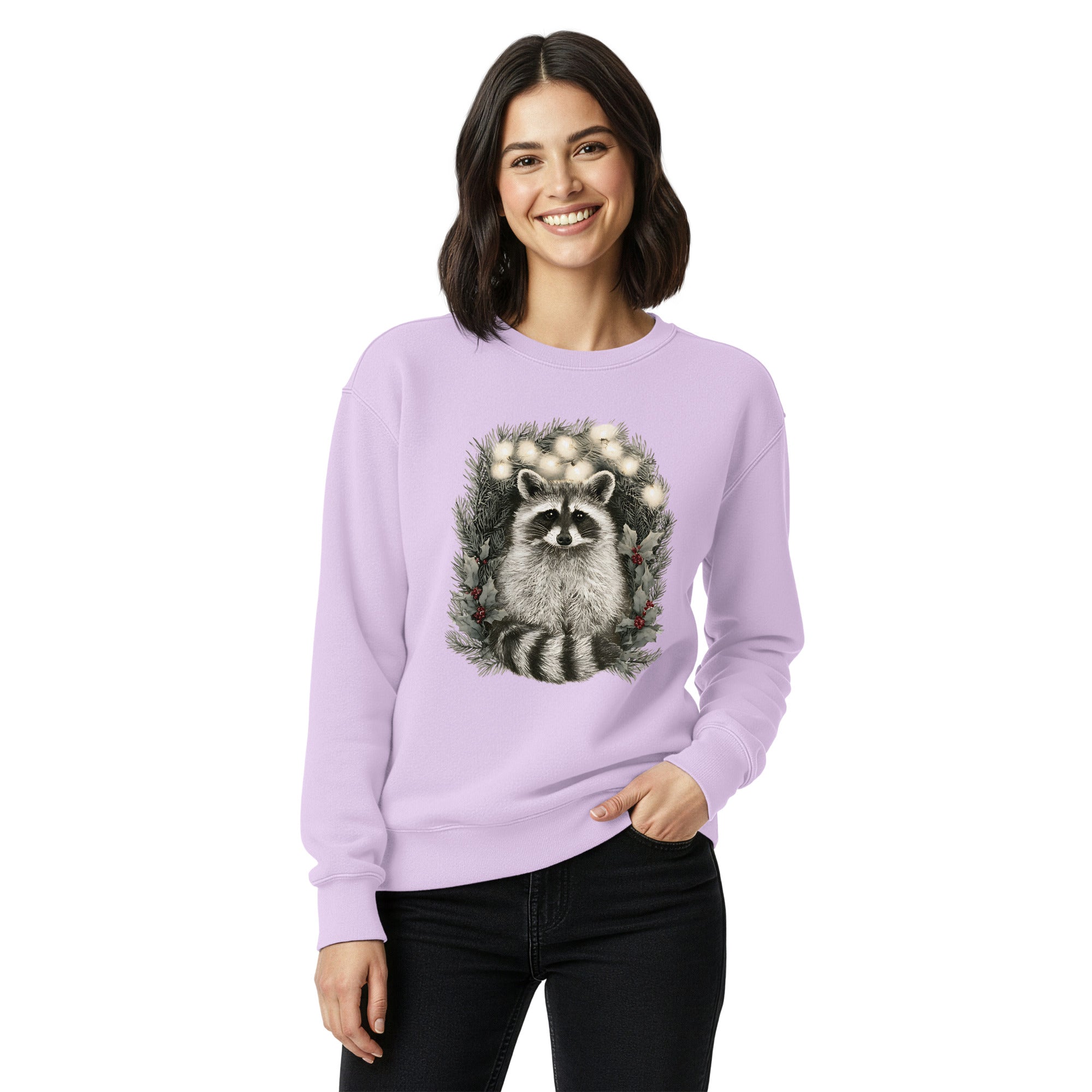 Raccoon in a Christmas wreath design on an Orchid garment-dyed sweatshirt