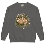 Fox asleep in a Christmas wreath design on a Pepper garment-dyed sweatshirt