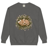 Fox asleep in a Christmas wreath design on a Pepper garment-dyed sweatshirt