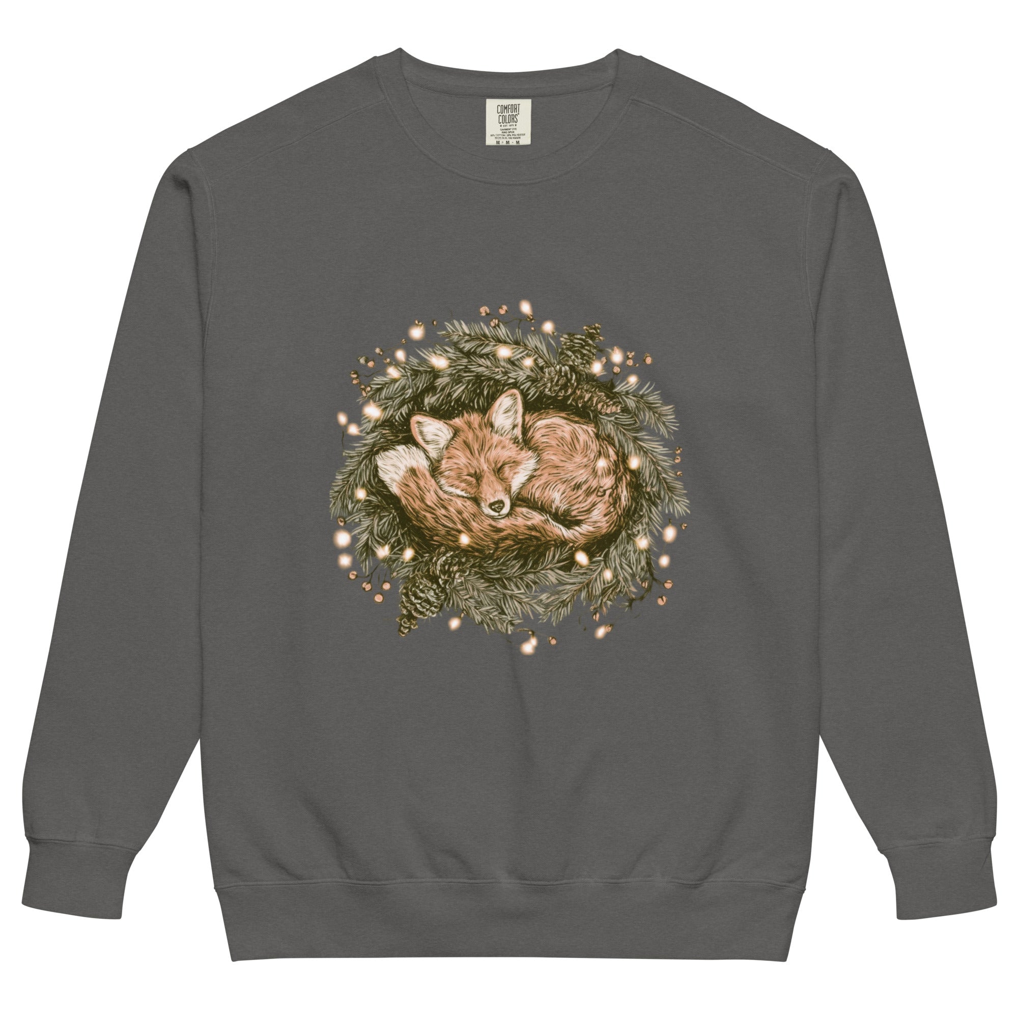 Fox asleep in a Christmas wreath design on a Pepper garment-dyed sweatshirt