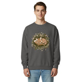 Fox asleep in a Christmas wreath design on a Pepper garment-dyed sweatshirt