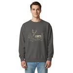 White stag among pine boughs design on a Pepper garment-dyed sweatshirt