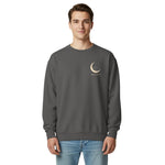 Sleepy fox in a crescent moon design on a Pepper garment-dyed sweatshirt
