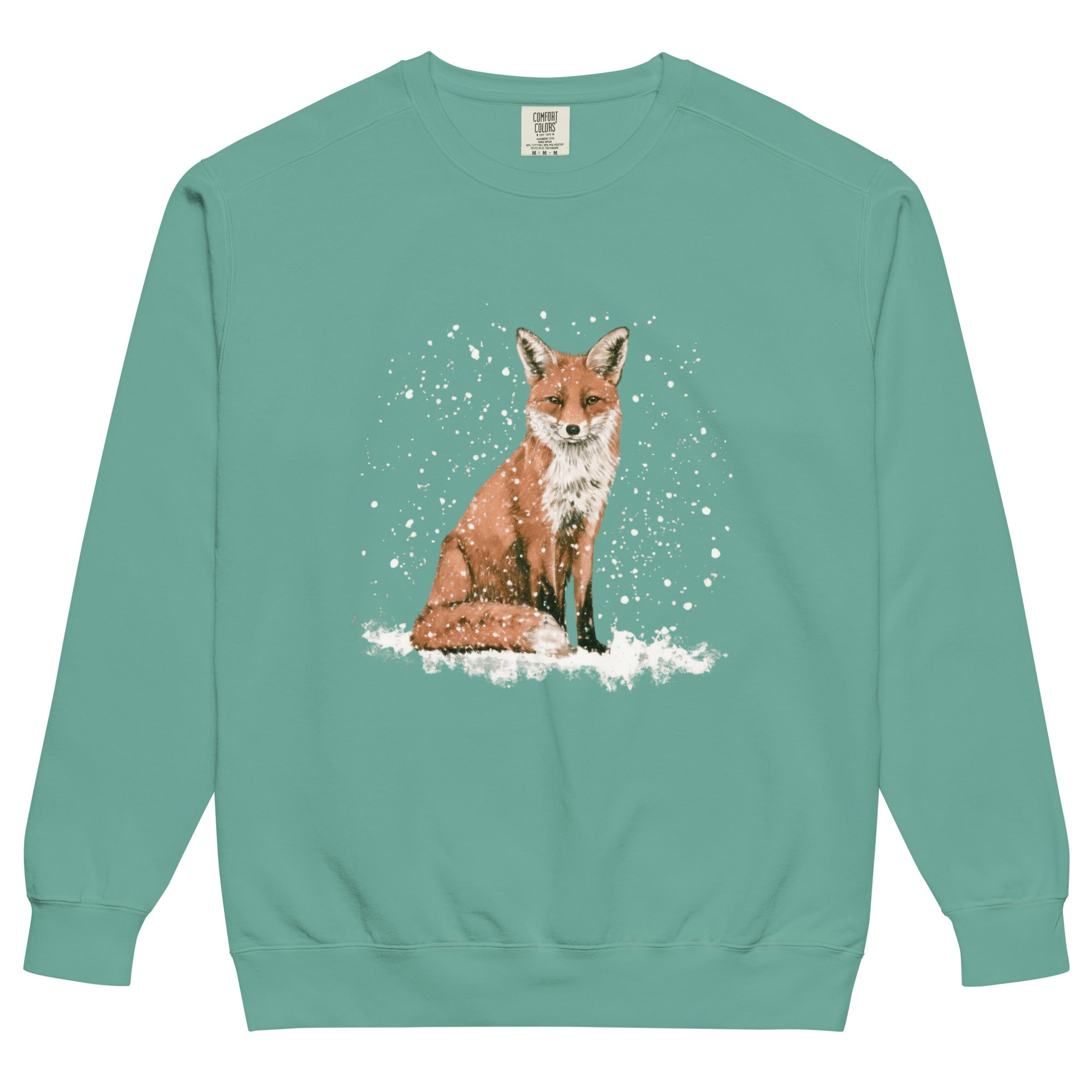 Red fox sitting in the snow design on a Seafoam garment-dyed sweatshirt