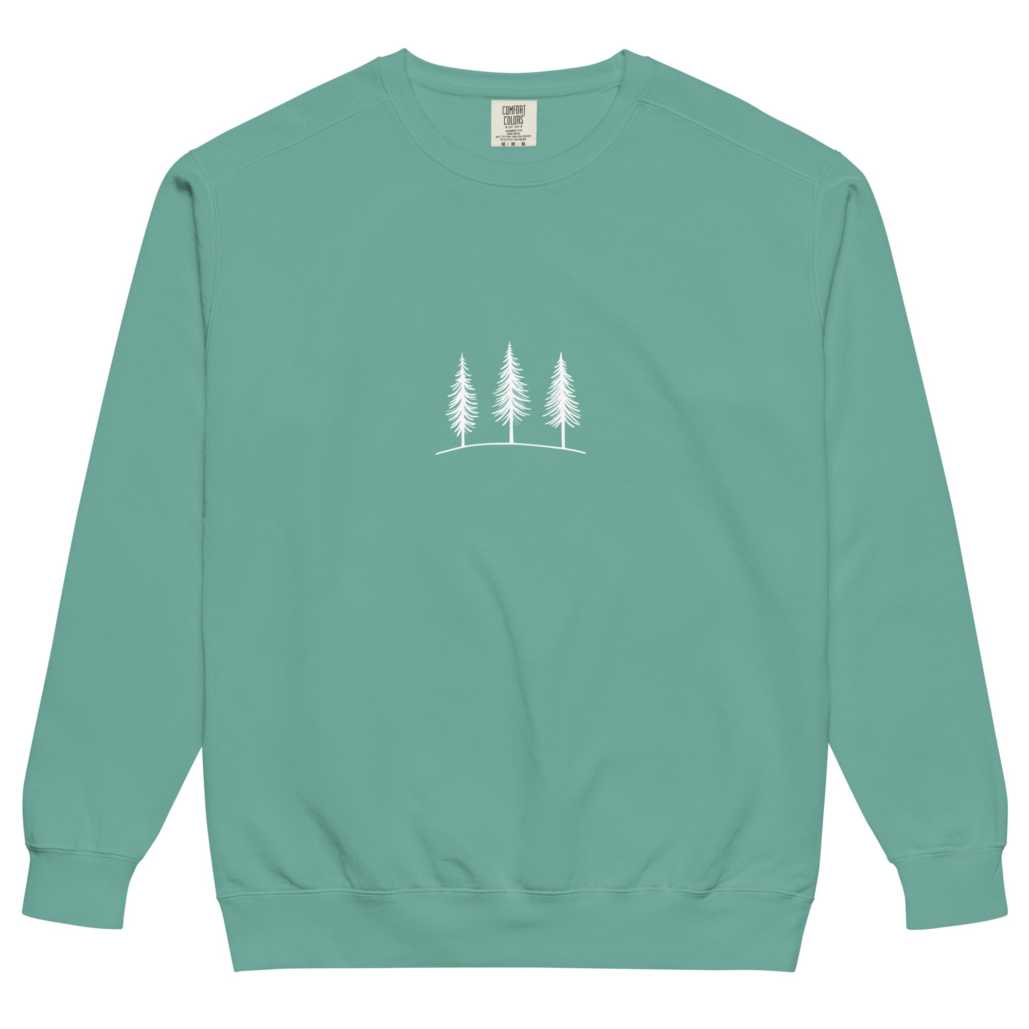 Three pine trees design on a Seafoam garment-dyed sweatshirt