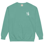 Snowman and Christmas tree design on a Seafoam garment-dyed sweatshirt