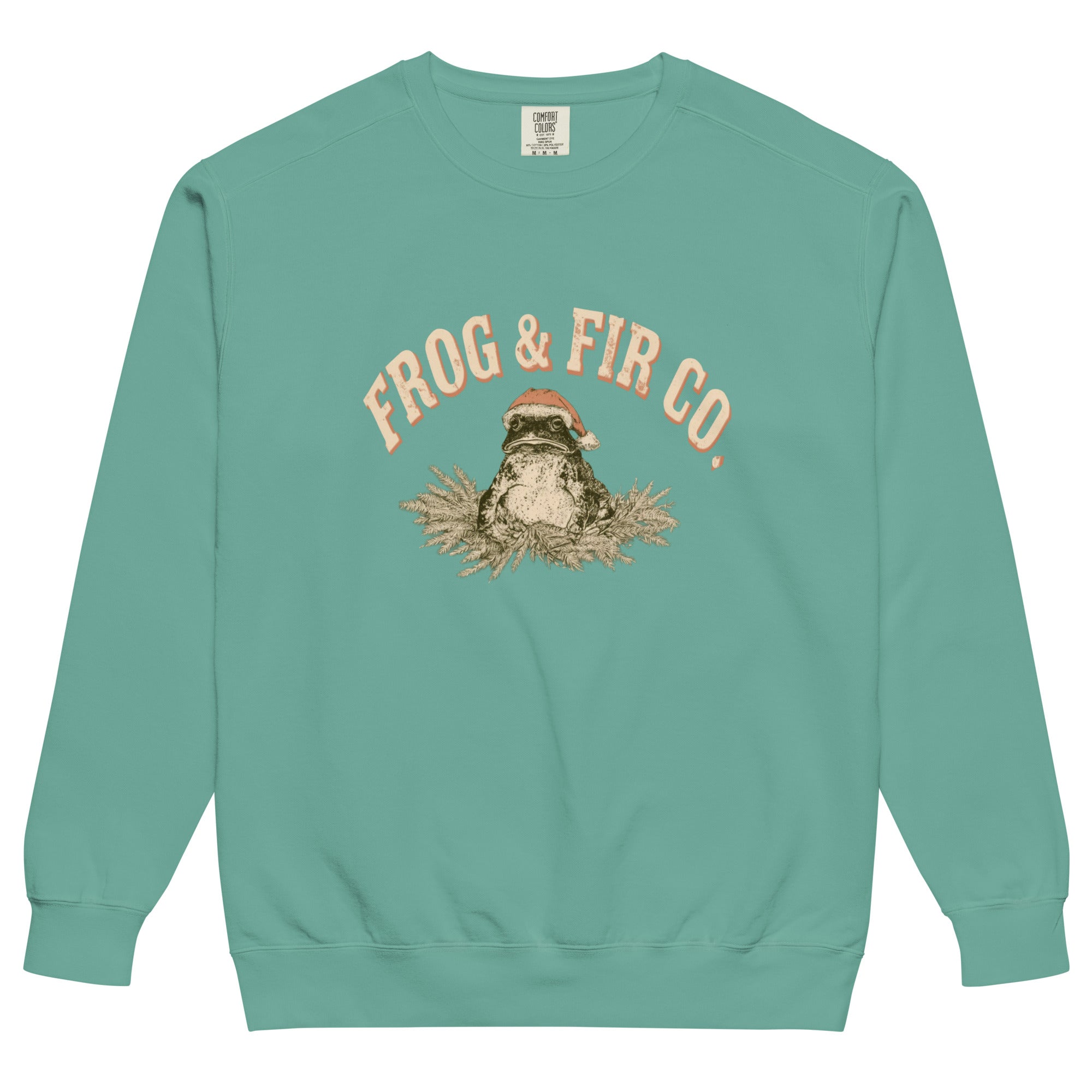 Toad and ferns badge design on a Seafoam garment-dyed sweatshirt