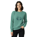 Stag emblem with pine and snow design on a Seafoam garment-dyed sweatshirt