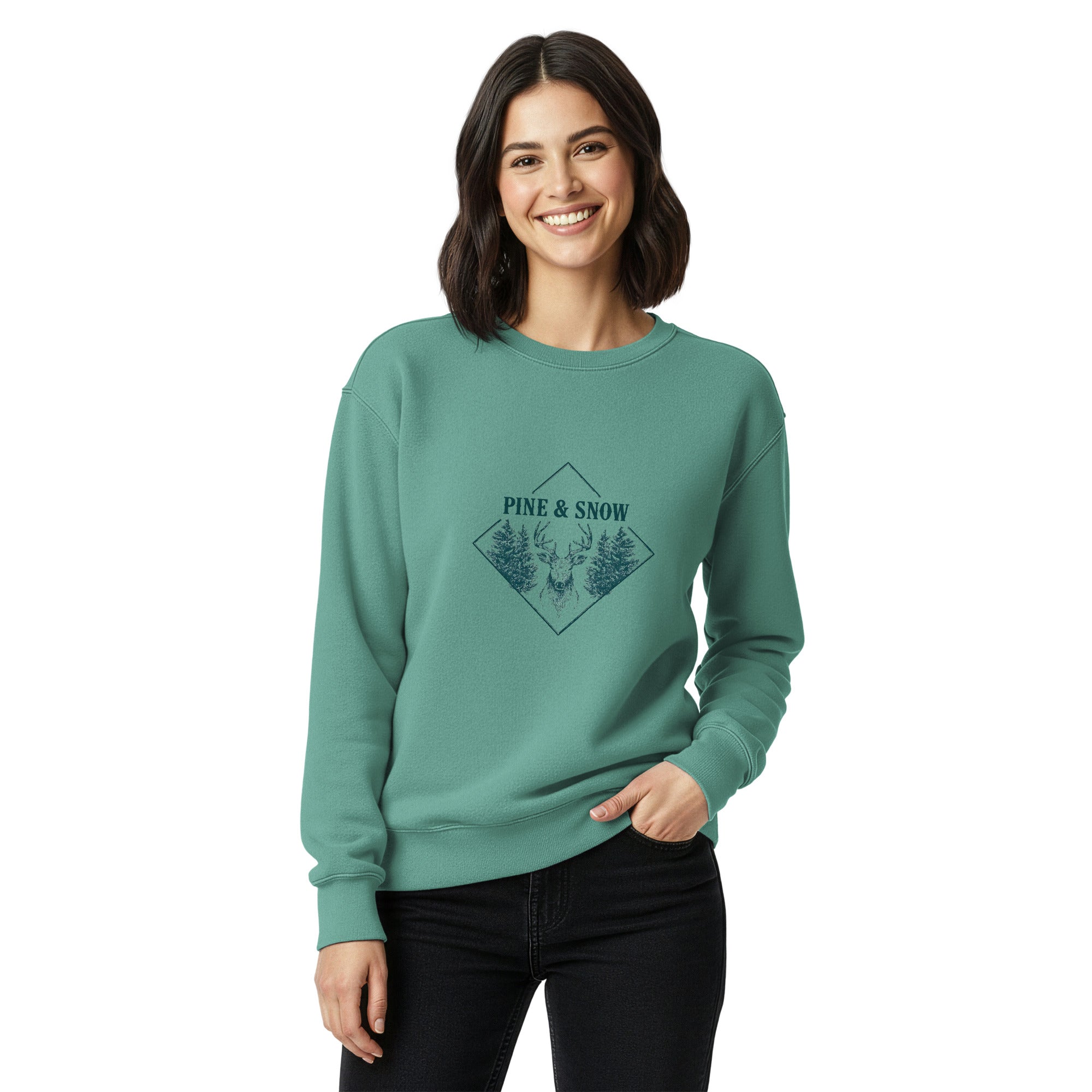 Stag emblem with pine and snow design on a Seafoam garment-dyed sweatshirt
