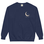 Sleepy fox in a crescent moon design on a True Navy garment-dyed sweatshirt