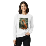 Red fox among winter pines design on a White garment-dyed sweatshirt