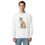 Red fox in falling snow design on a White garment-dyed sweatshirt