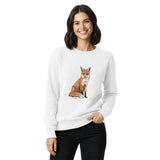 Red fox sitting in the snow design on a White garment-dyed sweatshirt