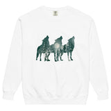 Howling wolves and moonlit forest design on a White garment-dyed sweatshirt