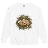 Fox asleep in a Christmas wreath design on a White garment-dyed sweatshirt