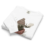 Moose in a beanie and scarf design on a White garment-dyed sweatshirt