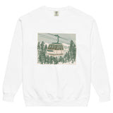 Ski gondola over pine forest design on a White garment-dyed sweatshirt