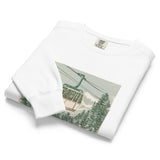 Ski gondola over pine forest design on a White garment-dyed sweatshirt