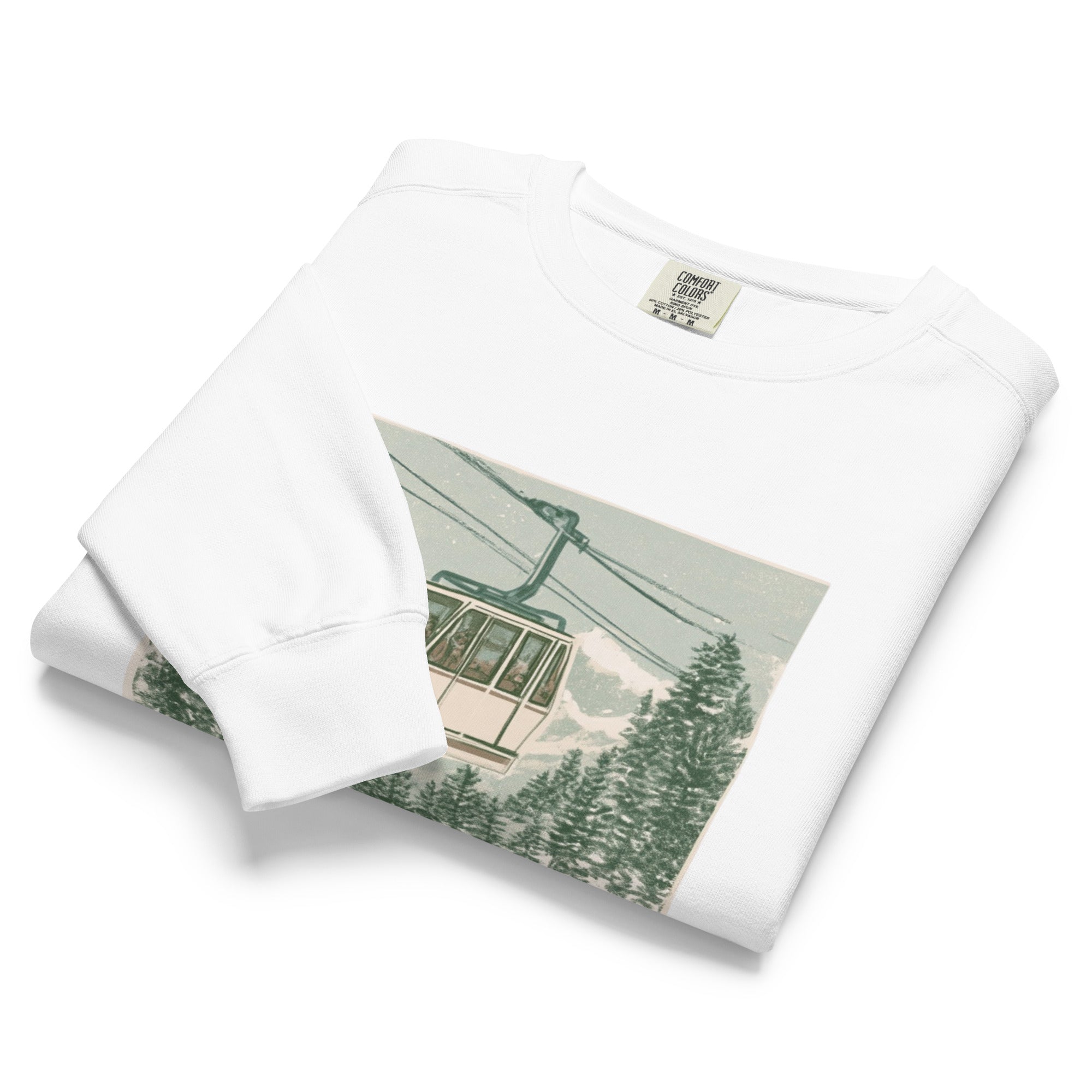 Ski gondola over pine forest design on a White garment-dyed sweatshirt