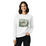 Ski gondola over pine forest design on a White garment-dyed sweatshirt