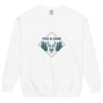 Stag emblem with pine and snow design on a White garment-dyed sweatshirt
