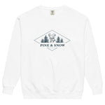 Deer and pines emblem design on a White garment-dyed sweatshirt