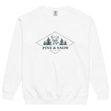 Deer and pines emblem design on a White garment-dyed sweatshirt